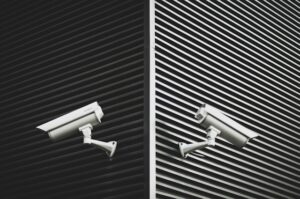 black and white walls with cctv security cameras
